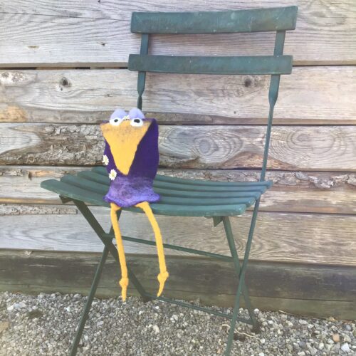 Vogel violett, sitzend